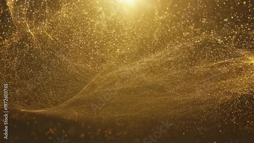 A gold background with a lot of sparkles. The gold color is prominent throughout the scene, creating a warm and luxurious atmosphere. The sparkles are scattered all over the background