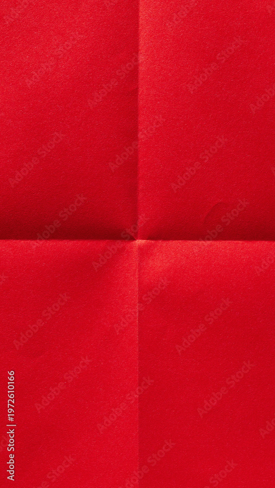 Fototapeta premium Vertical folded scarlet red sheet, paper textured background with copy space for social media design