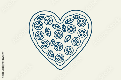 Heart shaped pizza with tomato slices and basil leaves