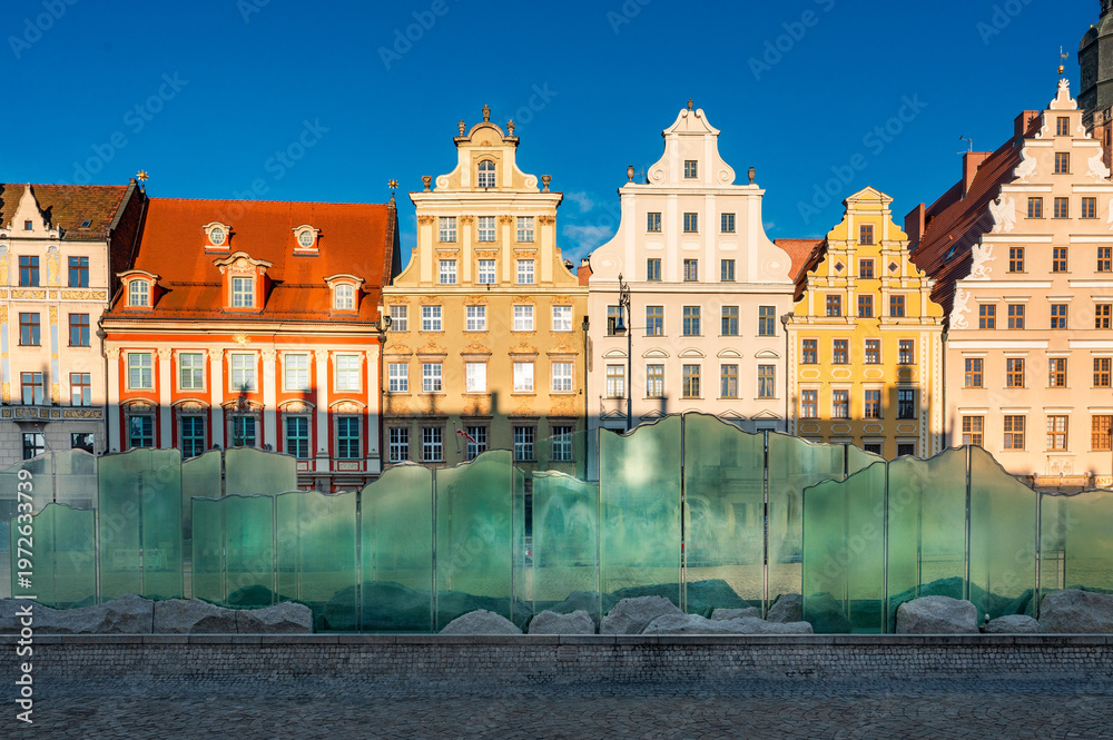 Obraz premium Colorful historic facades with geometric composition in Wroclaw Poland