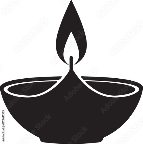 Traditional diya lamp with a lit wick inside a circular base silhouette vector icon