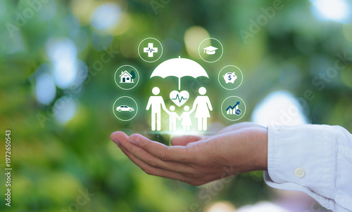 Digital insurance technology concept with businessman hand selecting family protection, health, finance, and retirement coverage icons on virtual interface for financial planning and risk management