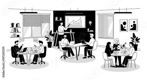 Group Of Professionals Collaborating At Coworking Tables.