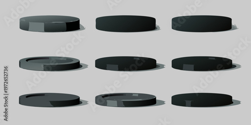 Arrangement of black cylindrical objects with varying heights and perspectives