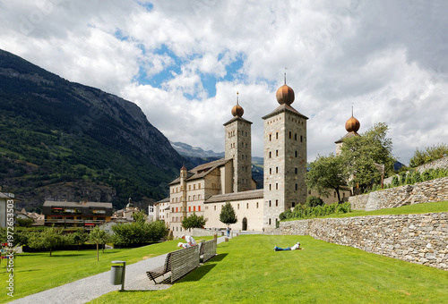 Принти на полотні Scenery of historic Stockalper Palace with towers of gilded onion domes and a to