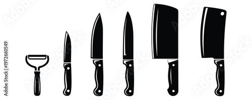 Collection of kitchen knives and cleaver on white background