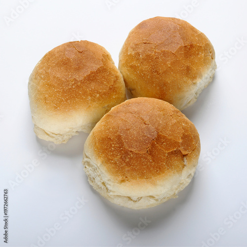 Crusty Fresh Baked Bread Rolls on white background