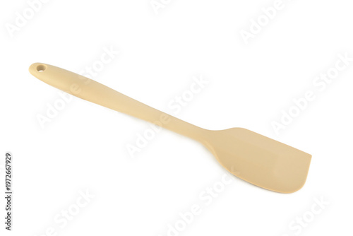 Beige silicone spatula for cooking and baking isolated on a white background.