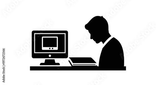 Man sitting at desk with computer.