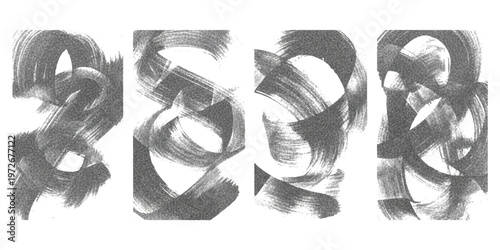 Abstract charcoal brush strokes arranged in a row against a plain white studio background surface