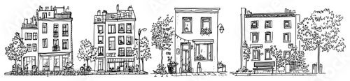 European townhouses and old apartment buildings on street in hand drawn engraving style