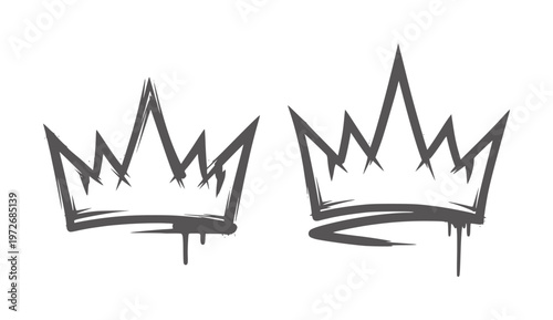 Two dark grey graffiti style crowns with dripping paint