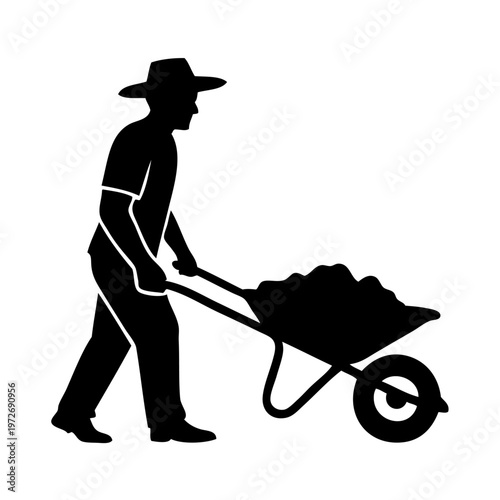 man pushing a wheelbarrow filled with soil