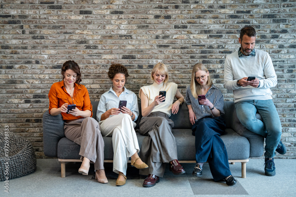 Fototapeta premium Group of diverse people using smartphones social media