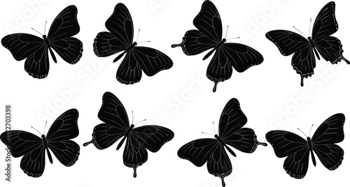 Collection of eight black butterflies with detailed wings on transparent background.