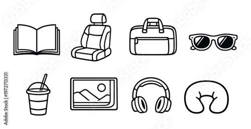 Travel accessories arranged in grid on gray background