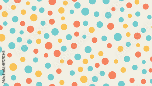 Playful seamless pattern featuring various sized polka dots in shades of orange, yellow, and turquoise on a light cream background.
