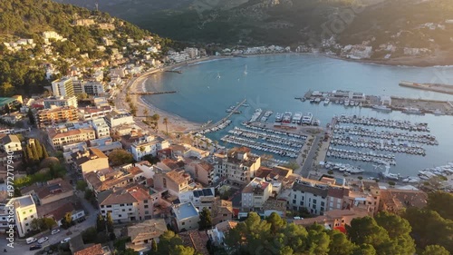 Wallpaper Mural Aerial view of Port de Soller harbor at sunset, beautiful coastal town with mountains and yachts in Mallorca. Golden hour over the Port de Soller and the Tramuntana mountains, Mallorca, Spain Torontodigital.ca