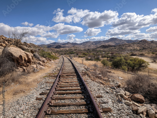 Scenic Railway Tracks Journey Through Rocky Mountains and Desert Wilderness – A Barren Countryside Travel Adventure with Stunning Horizon Views and Vintage Transportation