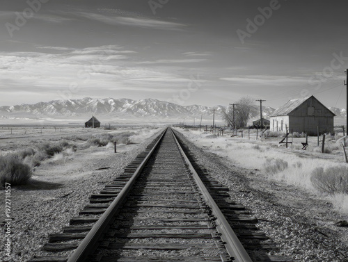 Timeless Black and White Photography of Deserted Train Tracks in the American West: A Vintage Perspective on Rural Landscapes and Lonely Horizons