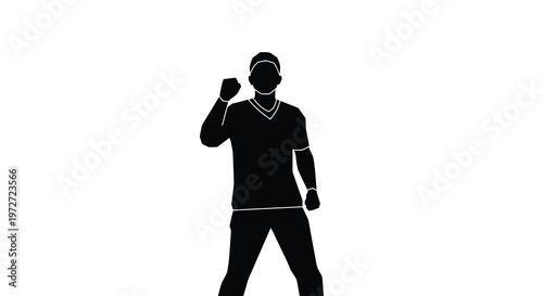 Silhouette of a man with a raised fist demonstrating strength and determination