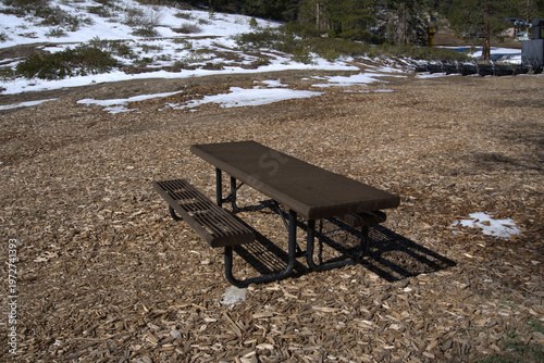 Outdoor Metal Picnic Table in Snowy Mountain Resort Area