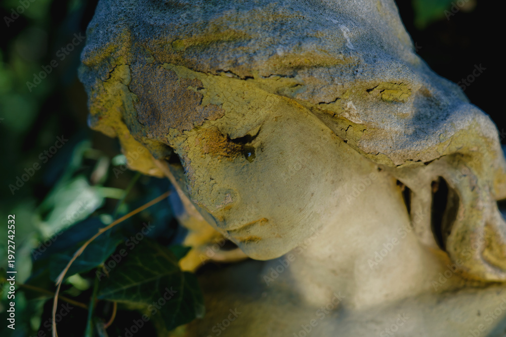 Fototapeta premium Crying angel statue symbolizing that even guardians feel pain, expressing deep emotion, vulnerability, and silent sorrow in a dramatic composition.