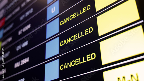 Airport display board. Airport departure information board displaying boarding gate open check in status and cancelled flights. Ideal for travel aviation tourism delay and transportation concepts.