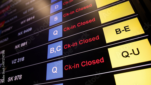 Airport display board. Airport departure information board displaying boarding gate open check in status and cancelled flights. Ideal for travel aviation tourism delay and transportation concepts.