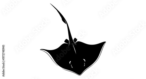 Black silhouette of a stingray swimming.
