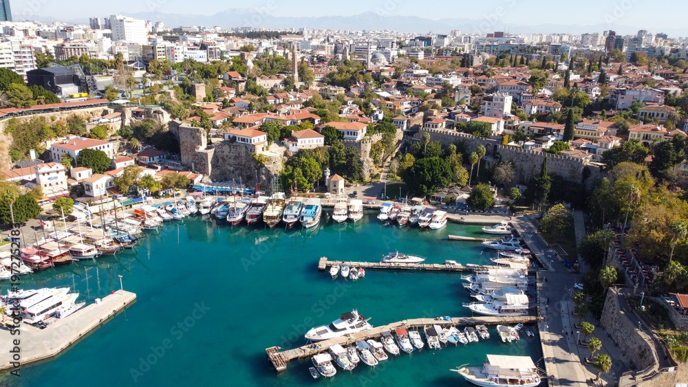 Fototapeta premium Aerial High Angle View of Historic Kaleici Old Harbor with Yachts and Lighthouse in Antalya Turkey