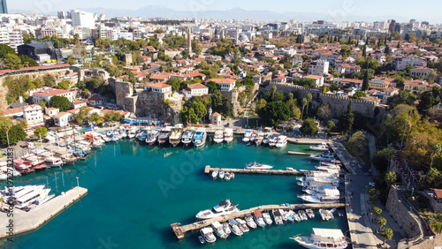 Aerial High Angle View of Historic Kaleici Old Harbor with Yachts and Lighthouse in Antalya Turkey