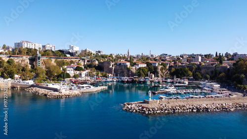 Aerial High Angle View of Historic Kaleici Old Harbor with Yachts and Lighthouse in Antalya Turkey