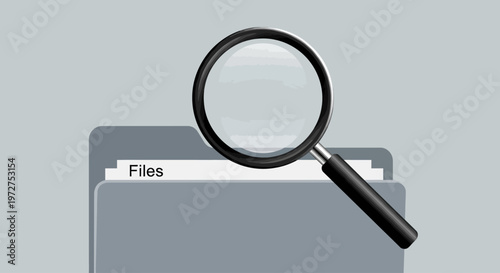 Magnifying Glass on File Folder Closeup.