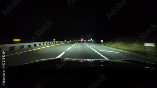 Driving on Highway at Night With Bright Road Lights