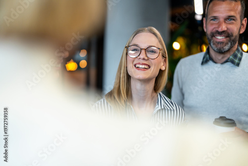 Bilde på lerret Happy business colleagues smiling and collaborating in office meeting