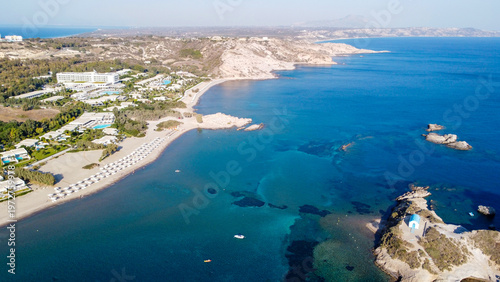 Foto Aerial High Angle View of Agios Stefanos Beach and Kastri Islet with Ancient Rui