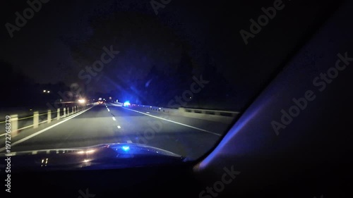 Driving Towards Flashing Lights of an Emergency Vehicle at Night