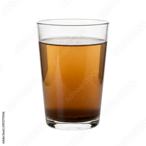 Glass of dirty brown water with sediment