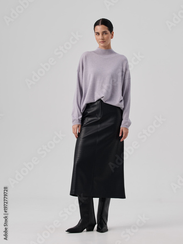 Fashion shooting in studio . Professional model , fashionable clothes and style, new collection. stylish look