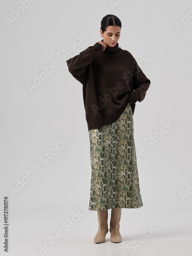 Fashion shooting in studio . Professional model , fashionable clothes and style, new collection. stylish look