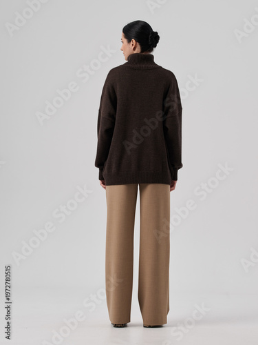 Fashion shooting in studio . Professional model , fashionable clothes and style, new collection. stylish look	