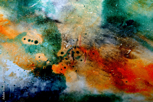 art background from green orange divorces in a cold tone