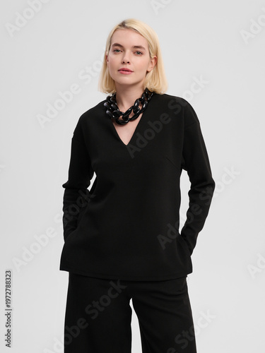 Fashion shooting in studio . Professional model , fashionable clothes and style, new collection. stylish look	