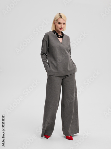 Fashion shooting in studio . Professional model , fashionable clothes and style, new collection. stylish look	