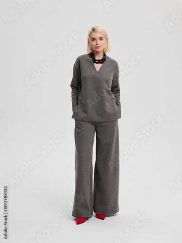 Fashion shooting in studio . Professional model , fashionable clothes and style, new collection. stylish look	