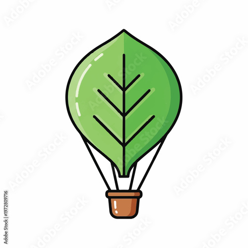 A green leaf shaped hot air balloon floats gently in the air.