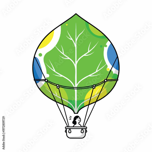A hot air balloon floats gently above the ground with a leaf design
