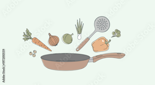 Copper frying pan with kitchen tools.