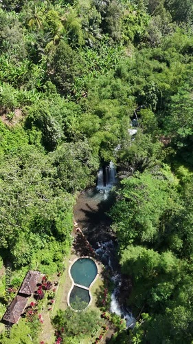 Aerial View of Lush Tropical Jungle Waterfall and Natural Pools